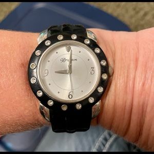 Pretty Brighton black watch with rhinestones around the white face.